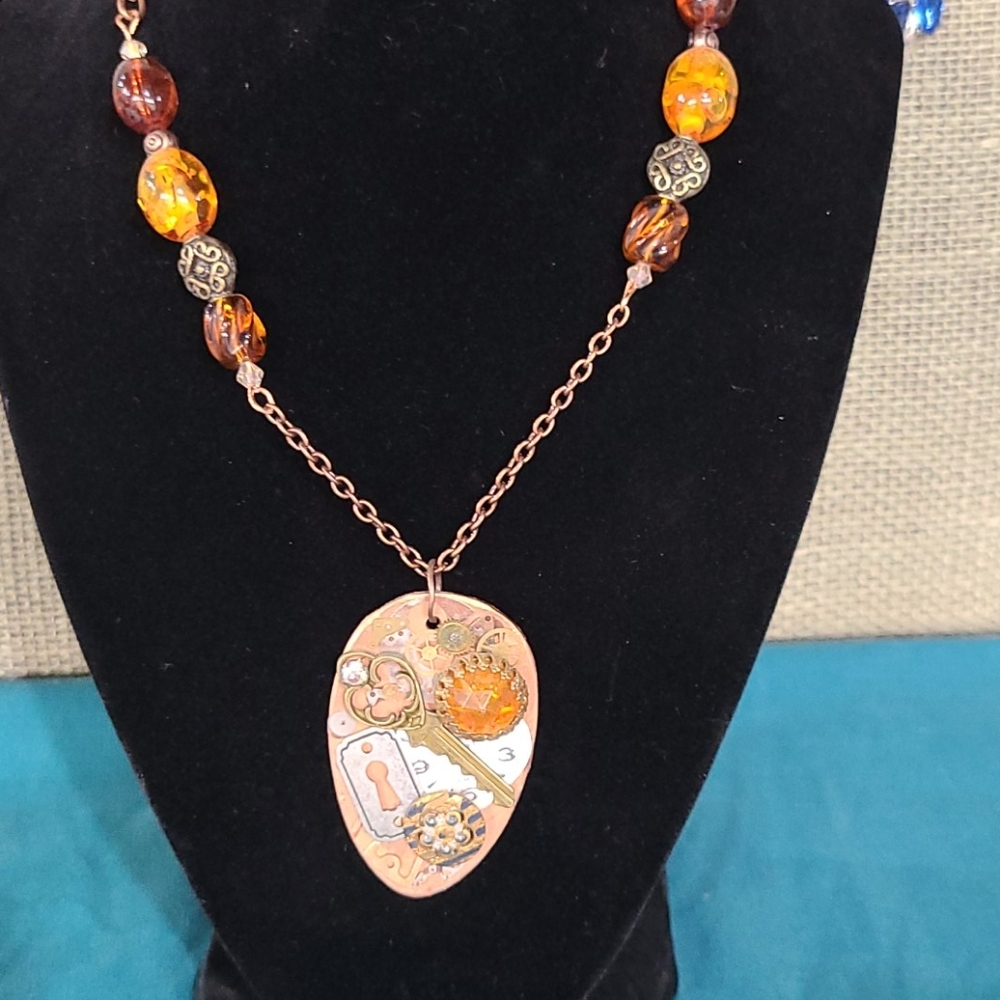Women's copper colored hand crafted necklace
